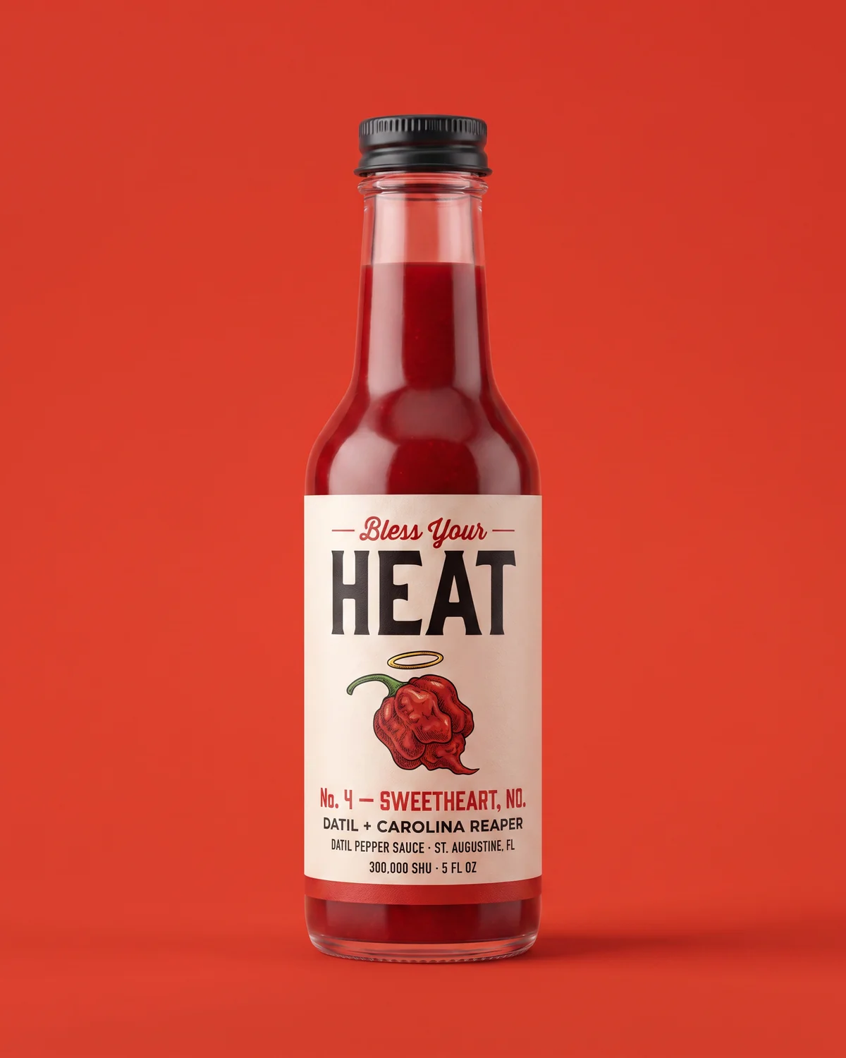 Sweetheart, No. bottle — deep crimson Carolina reaper sauce on a bright red field, a small halo over the reaper on the label.